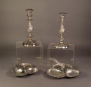 PAIR OF SILVER PLATED ON COPPER CANDLESTICKS, each with baluster column and lobated base, embossed