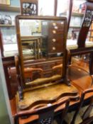 VICTORIAN MAHOGANY LARGE TOILET MIRROR, THE OBLONG PLATE IN A MOULDED FRAME, FLANKED BY SCROLL