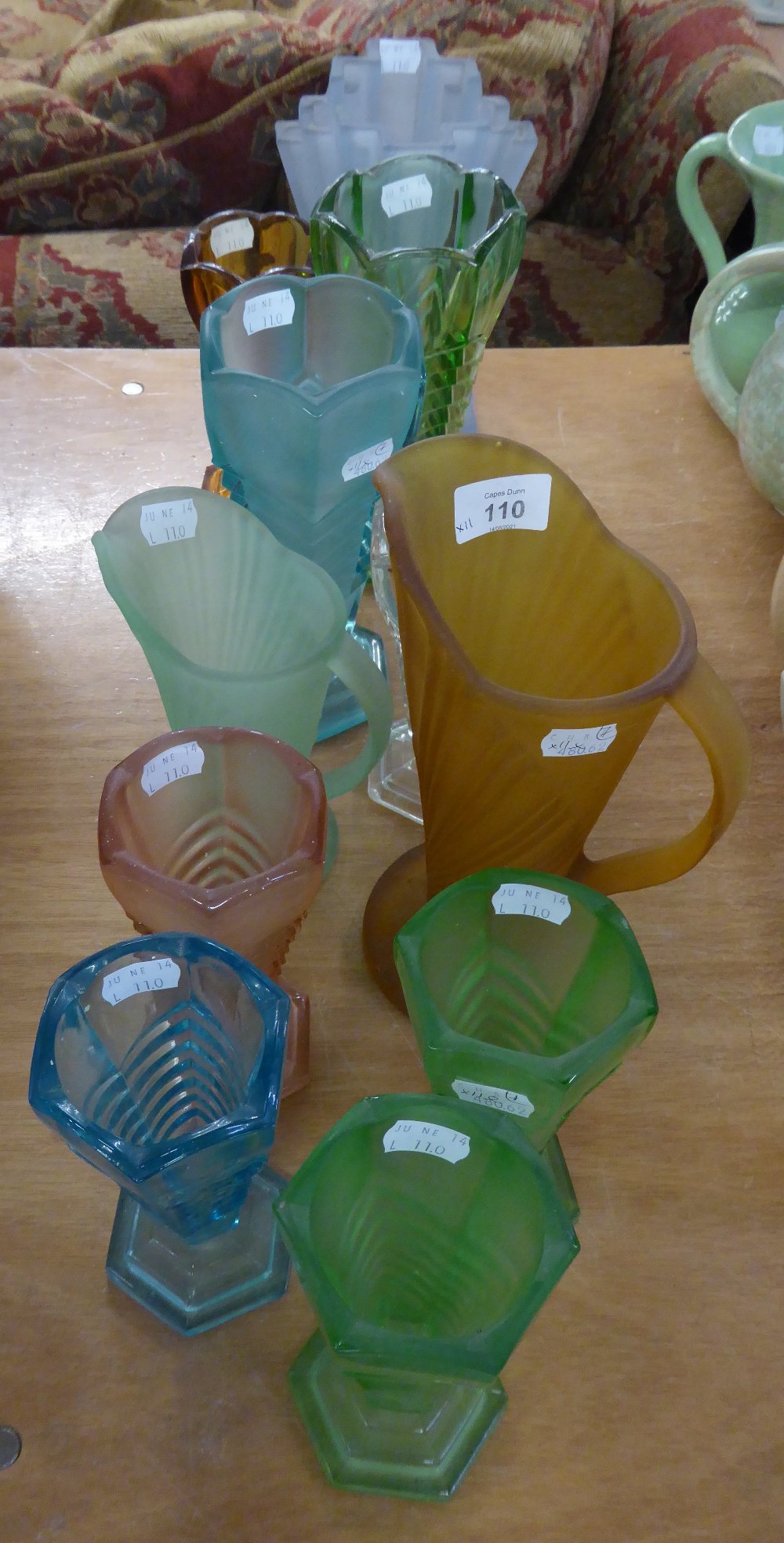 ELEVEN ART DECO MOULDED GLASS JUGS AND VASES, all coloured except one, including: SET OF SIX
