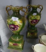 A PAIR OF VICTORIAN POTTERY TWO HANDLED PEDESTAL VASES, FLORAL PRINTED DECORATION, 11 ½? HIGH