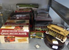 SIX MINT AND BOXED, MAINLY DIE CAST MODELS OF BUSES AND TRAMS; ANOTHER FELTHAM TRAM, (UNBOXED)