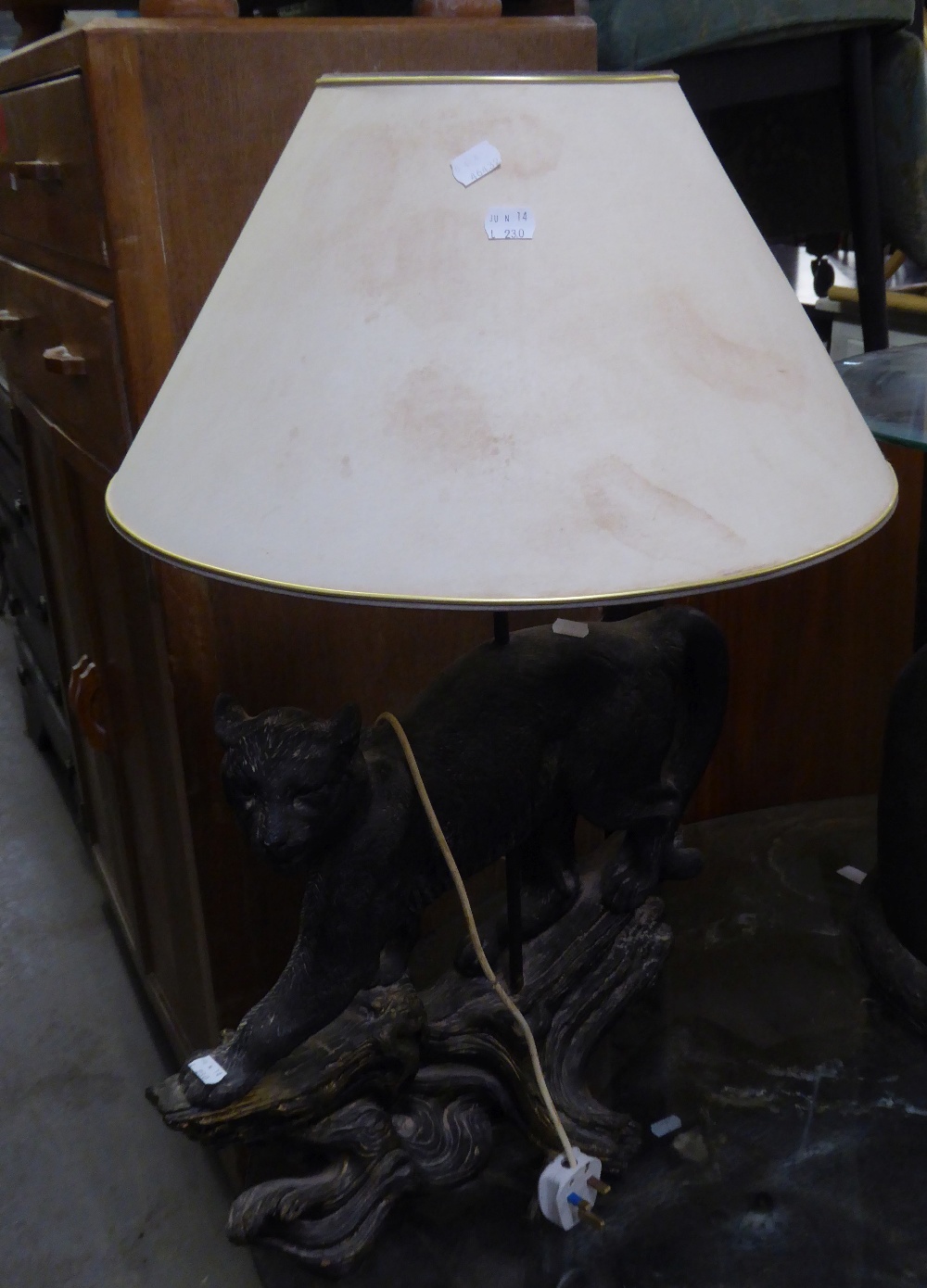 A LAMP TABLE, WITH CIRCULAR GLASS TOP, ON BLACK FIBREGLASS DRUM SHAPED BASE, EMBOSSED IN HIGH RELIEF - Image 2 of 2