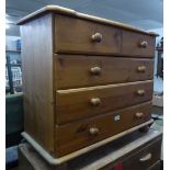 A PINE SMALL CHEST OF TWO SHORT AND THREE LONG DRAWERS, WITH KNOB HANDLES, ON BUN FEET, 2?7? WIDE