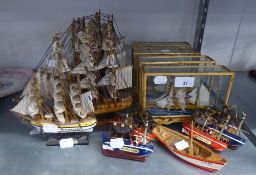 FOURTEEN SMALL MODELS OF GALLEONS AND SMALL BOATS