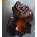 EIGHT LEATHER WALLETS AND STATIONERY FOLDERS AND A LEATHER HOLDALL