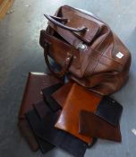 EIGHT LEATHER WALLETS AND STATIONERY FOLDERS AND A LEATHER HOLDALL