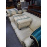A LOUNGE SUITE OF FOUR PIECES, UPHOLSTERED AND COVERED IN EMBOSSED CREAM AND BLUE STRIPED FABRIC,