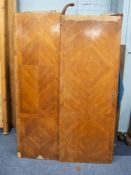 FRENCH OAK CARCASE AND QUARTER VENEERED KINGWOOD ARMOIRE, the flat top above a pair of long doors