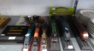 SEVEN PLASTIC STATIONARY MODELS OF STEAM LOCOMOTIVES WITH TENDERS, ON STANDS; CORGI ?RAIL LEGENDS?