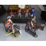 TWO COLD PAINTED LEAD EQUESTRIAN SOLDIERS AND A SET OF FOUR SOLDIERS (6)