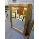 A MODERN GILT FRAMED BEVELLED WALL MIRROR, 43" X 31"