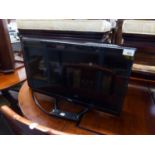 POLAROID 23" FLAT SCREEN TELEVISION/DVD PLAYER