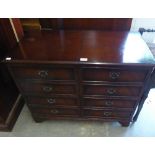 A REPRODUCTION MAHOGANY STEREO UNIT, WITH FALSE DRAWERS AND LIFT-UP TOP AND A MAHOGANY PIANO