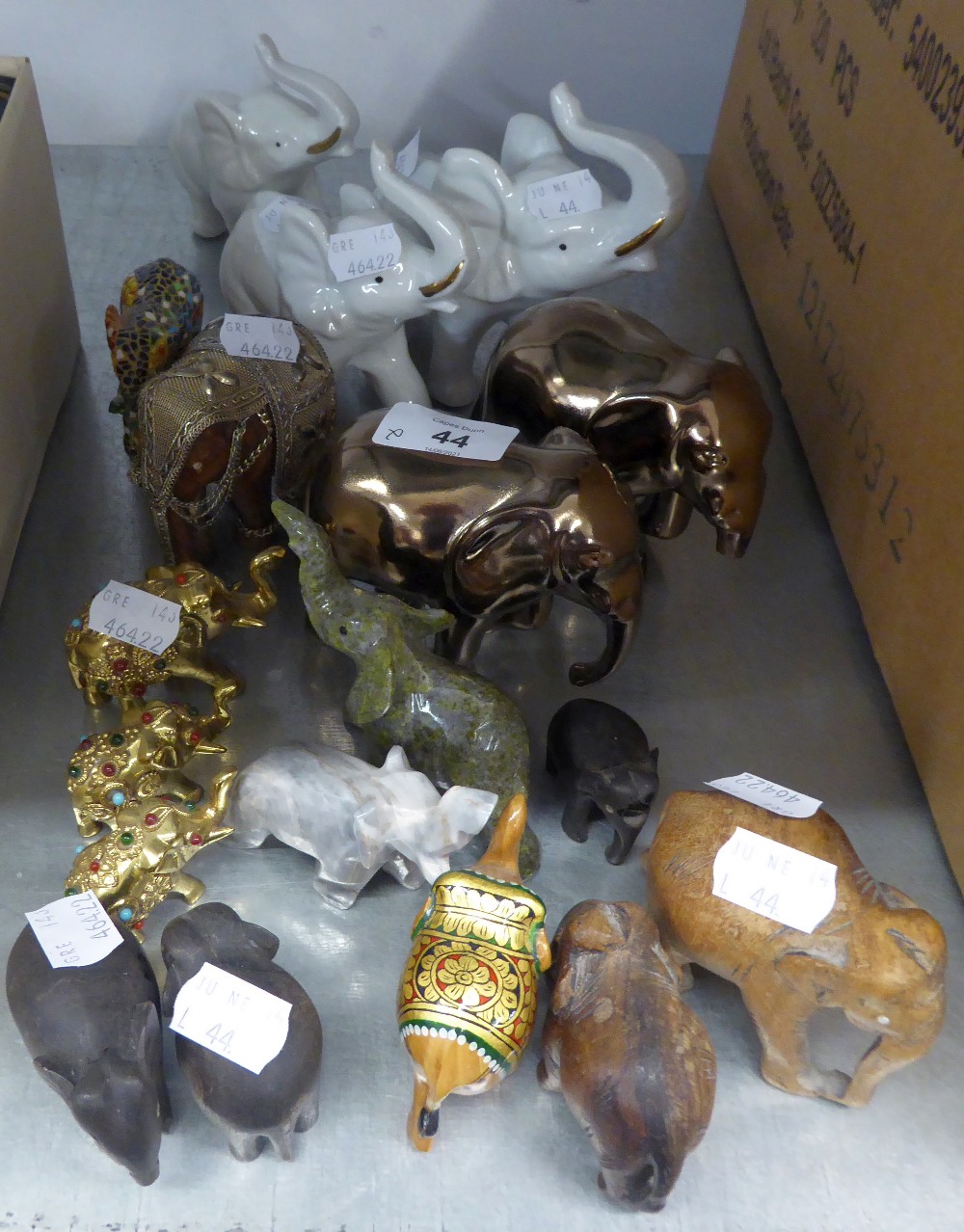 A SELECTION OF SMALL POTTERY, WOODEN AND BRASS ELEPHANTS (APPROX 18)