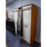 A TEAK AND WHITE FINISH LOUVRED TWO DOOR HANG WARDROBE WITH CENTRE MIRROR PANEL, 3?9? WIDE AND THE