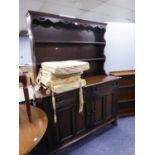 A LARGE OAK WELSH DRESSER WITH RAISED PLATE RACK, TWO DRAWERS OVER TWO CUPBOARDS, 4?6? WIDE