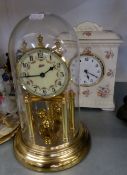 AN ANNIVERSARY CLOCK, UNDER GLASS DOME SHADE AND A POTTERY FLORAL DECORATION CLOCK (2)
