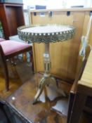 A MAHOGANY TRIPOD WINE TABLE, THE PINK MARBLE CIRCULAR TOP HAVING FANCY BRASS GALLERY BORDER, 13?