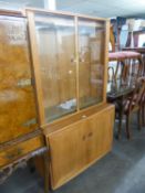 ERCOL WINDSOR DISPLAY CABINET, TOP HAVING TWO GLASS DOORS AND GLASS ADJUSTABLE SHELVES, THE BASE