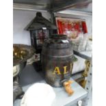 SMALL BARREL WITH TAP AND LABELLED 'ALE' AND A WOOD AND GLAZED LANTERN PATTERN TABLE LAMP (2)