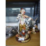 LEONARDO RESIN FIGURE, CIRCUS CLOWN, ON WOOD PLINTH, 9 3/4in (24.7cm) HIGH