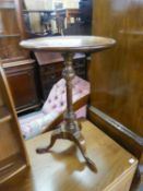 A MAHOGANY TRIPOD WINE TABLE WITH CIRCULAR TOP