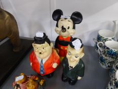 2 POTTERY FIGURE MONEY BOXES, AS LAUREL & HARDY AND A SOFT PLASTIC MICKEY MOUSE SQUEAKY TOY (3)