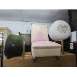 VICTORIAN ALL-UPHOLSTERED NURSING CHAIR , TWO CIRCULAR POUFFE?S, IN FLORAL TAPESTRY (3)