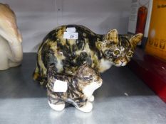 HILLWORTH, ENGLAND, LARGE POTTERY MODEL OF A SEATED TABBY CAT WITH GLASS EYES, 12in (30.4cm) LONG