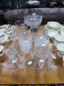 CUT GLASS LARGE FRUIT DISH ON BLACK STAND, ANOTHER CUT GLASS FRUIT BOWL, WATER JUG, JAR AND COVER