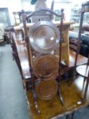 A MAHOGANY THREE TIER FOLDING CAKE STAND