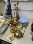 MIXED LOT TO INCLUDE A COPPER KETTLE, A BRASS FIRE COMPANION SET, TWO BRASS TRIVETS; THREE