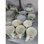 1960s/70s MIDWINTER TEA SERVICE TO INCLUDE, A TEAPOT, MILK JUG, SUGAR BASIN AND 12 TEACUPS AND