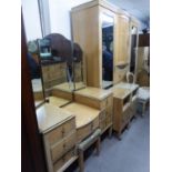 A BLEACHED WALNUT VENEERED BEDROOM SUITE OF SIX PIECES, VIZ A WARDROBE 6? WIDE; SUNK CENTRE DRESSING