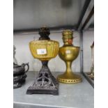 VICTORIAN OIL TABLE LAMP WITH BLACK CAST IRON PIERCED SQUAR BASE, YELLOW GLASS RESERVOIR AND THE