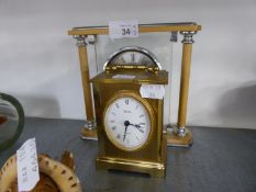 LONDON CLOCK COMPANY QUARTZ MANTEL CLOCK WITH SIDE COLUMNS AND AN ACCTIM BRASS CASED BATTERY