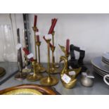 SET OF 7 BRASS GRADUATED CANDLESTICKS WITH SLENDER COLUMNS AND DISHED CIRCULAR BASES; TWO BRASS SWAN