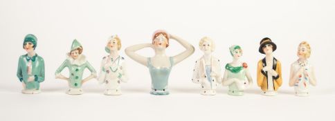 EIGHT MEDIUM SIZE 1920's STYLE CHINA PIN CUSHION HALF FIGURES, in costume of the period including