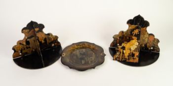 PAIR OF 19th CENTURY BLACK LACQUER AND CHINOISERIE DECORATED PAPIER MACHE FOLDING WALL BRACKETS,