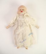 VINTAGE GERMAN BISQUE HEAD THREE FACE DOLL with bisque lower arms and feet, 12 1/2in (32cm) long