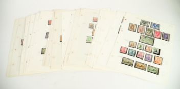 A MINT AND USED COLLECTION ARRANGED ON ALBUM LEAVES  for the countries, Australia, Belgium, Canada