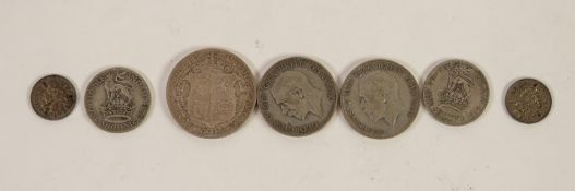 SELECTION OF SEVEN GEORGE V SILVER COINS to include; 1918 half crown (VF), TWO FLORINS, TWO ONE
