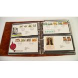 POST OFFICE RING BINDER ALBUM OF APPROXIMATELY 60 FIRST DAY COVERS, CIRCA 1983 - 2000, together with
