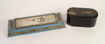 JAPANESE BLACK LACQUERED AND DECORATED PAPIER MACHE ROUNDED OBLONG BOX AND COVER, WITH INTERIOR