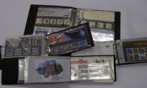 A COLLECTION OF GREAT BRITAIN,  containing four albums of Presentation Packs