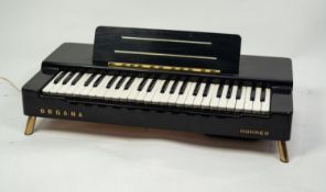 HOHNER (GERMANY), CIRCA 1960s 'ORGANA' TABLE TOP ELECTRONIC ORGAN, high gloss black plastic case, 26