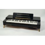 HOHNER (GERMANY), CIRCA 1960s 'ORGANA' TABLE TOP ELECTRONIC ORGAN, high gloss black plastic case, 26