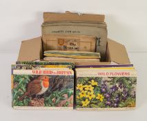 FOUR SENIOR SERVICE CIGARETTE CARD ALBUMS, with real photograph cards fitted in, viz Britain from