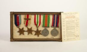 A GROUP OF FIVE WORLD WAR II SERVICE MEDALS WITH ORIGINAL MEDAL AWARDS CARD, viz 1939 ? 45 war medal