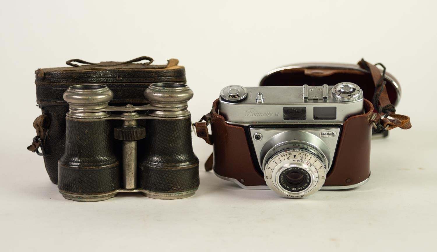 KODAK RETINETTE IA ROLL FILM CAMERA with LEATHER CASE AND LIGHT METER and a pair of PRE-WAR FIELD